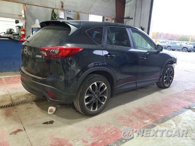 Trzecie zdjęcie samochodu z tyłu: 2016 MAZDA CX-5 GT VIN:JM3KE4DY9G0692407 - miniatura
