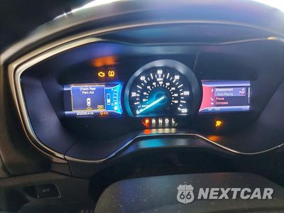 Zdjęcie 9 z 12 samochodu: 2013 FORD FUSION SE PHEV VIN:3FA6P0PUXDR235516 - miniatura