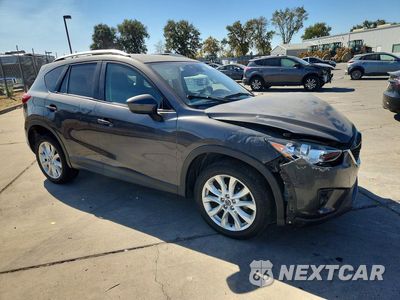 Czwarte zdjęcie samochodu z boku: 2014 MAZDA CX-5 GT VIN:JM3KE4DY1E0342508 - miniatura