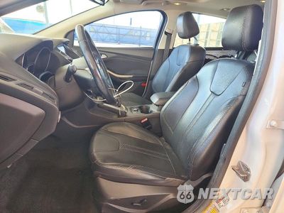 Zdjęcie 7 z 12 samochodu: 2012 FORD FOCUS SEL VIN:1FAHP3H22CL371577 - miniatura