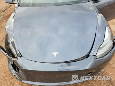 Zdjęcie 11 z 12 samochodu: 2023 TESLA MODEL Y VIN:7SAYGDEE7PF839765 - miniatura
