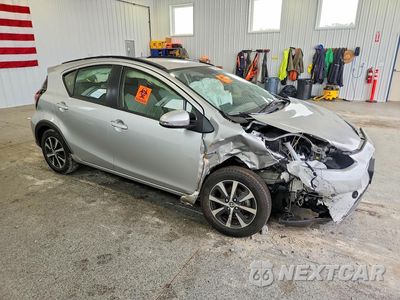 Czwarte zdjęcie samochodu z boku: 2018 TOYOTA PRIUS C ONE VIN:JTDKDTB36J1600376 - miniatura