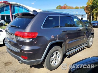Trzecie zdjęcie samochodu z tyłu: 2014 JEEP GRAND CHEROKEE LAREDO VIN:1C4RJFAG1EC226735 - miniatura