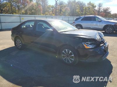 Czwarte zdjęcie samochodu z boku: 2016 VOLKSWAGEN JETTA S VIN:3VW267AJ6GM366590 - miniatura