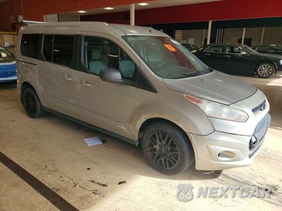 Czwarte zdjęcie samochodu z boku: 2014 FORD TRANSIT CONNECT XLT VIN:NM0GE9F74E1148546 - miniatura