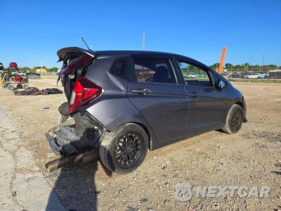 Trzecie zdjęcie samochodu z tyłu: 2020 HONDA FIT LX VIN:3HGGK5H44LM703438 - miniatura