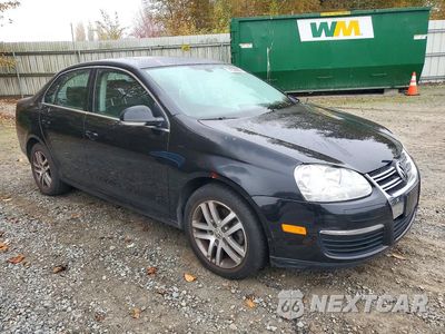 Czwarte zdjęcie samochodu z boku: 2005 VOLKSWAGEN NEW JETTA 2.5L OPTION PACKAGE 1 VIN:3VWSF71K25M630426 - miniatura