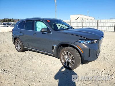 Czwarte zdjęcie samochodu z boku: 2026 BMW X5 XDRIVE50E VIN:5UX43EU02T9076382 - miniatura