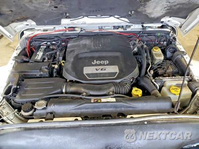 Zdjęcie 12 z 13 samochodu: 2015 JEEP WRANGLER UNLIMITED SAHARA VIN:1C4HJWEG5FL621671 - miniatura