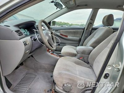 Zdjęcie 7 z 12 samochodu: 2003 TOYOTA COROLLA LE VIN:JTDBR32E332002651 - miniatura