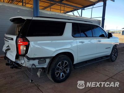 Trzecie zdjęcie samochodu z tyłu: 2021 CHEVROLET SUBURBAN K1500 Z71 VIN:1GNSKDKD4MR221099 - miniatura