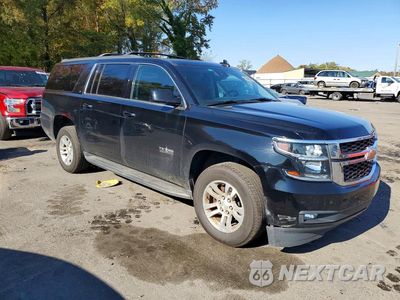 Czwarte zdjęcie samochodu z boku: 2020 CHEVROLET SUBURBAN K1500 LT VIN:1GNSKHKC9LR174214 - miniatura
