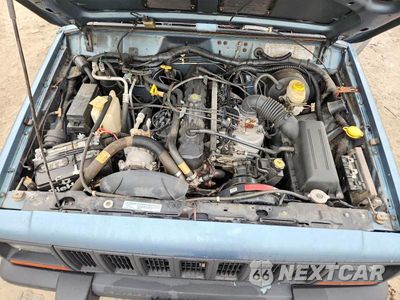 Zdjęcie 12 z 13 samochodu: 1999 JEEP CHEROKEE SPORT VIN:1J4FF68S3XL597942 - miniatura