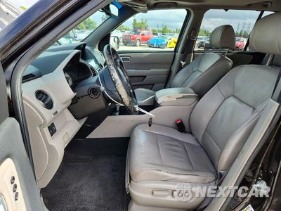 Zdjęcie 7 z 13 samochodu: 2011 HONDA PILOT TOURING VIN:5FNYF3H93BB047405 - miniatura