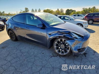 Czwarte zdjęcie samochodu z boku: 2023 TESLA MODEL Y VIN:7SAYGDEE2PA051375 - miniatura