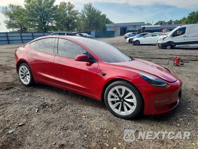 Czwarte zdjęcie samochodu z boku: 2022 TESLA MODEL 3 VIN:5YJ3E1EAXNF370418 - miniatura