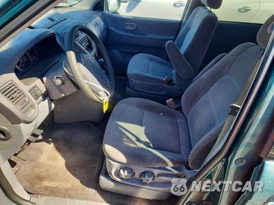 Zdjęcie 7 z 13 samochodu: 2003 KIA SEDONA LX VIN:KNDUP131136486584 - miniatura