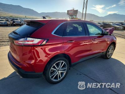Trzecie zdjęcie samochodu z tyłu: 2024 FORD EDGE TITANIUM VIN:2FMPK4K92RBA00455 - miniatura