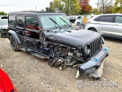 Czwarte zdjęcie samochodu z boku: 2023 JEEP WRANGLER 4XE VIN:1C4JJXN6XPW610759 - miniatura