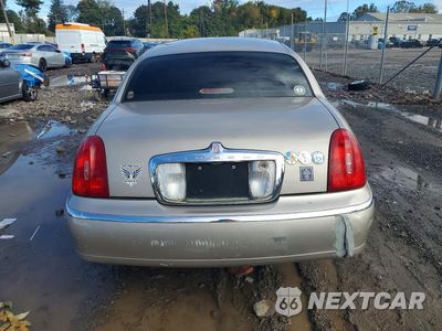Zdjęcie 6 z 13 samochodu: 2001 LINCOLN TOWN CAR SIGNATURE VIN:1LNHM82W01Y620885 - miniatura