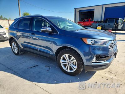 Czwarte zdjęcie samochodu z boku: 2019 FORD EDGE SEL VIN:2FMPK3J90KBC06276 - miniatura