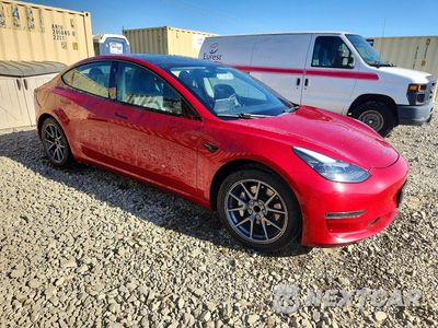 Czwarte zdjęcie samochodu z boku: 2022 TESLA MODEL 3 VIN:5YJ3E1EA0NF288908 - miniatura