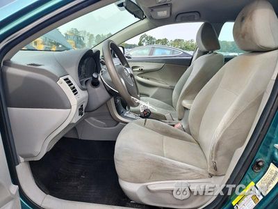 Zdjęcie 7 z 12 samochodu: 2010 TOYOTA COROLLA LE VIN:1NXBU4EEXAZ336172 - miniatura