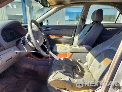 Zdjęcie 7 z 13 samochodu: 2003 TOYOTA CAMRY XLE V6 VIN:JTDBF30K730145406 - miniatura