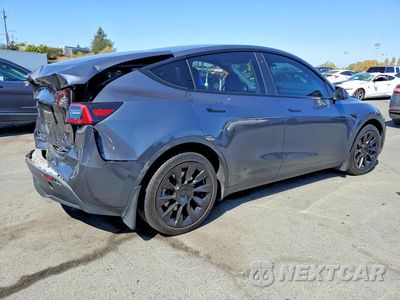 Trzecie zdjęcie samochodu z tyłu: 2023 TESLA MODEL Y VIN:7SAYGAEE8PF743044 - miniatura
