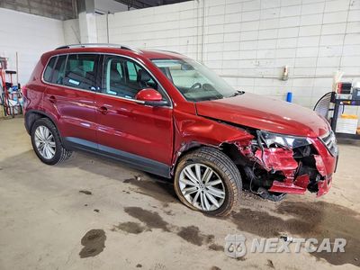 Czwarte zdjęcie samochodu z boku: 2011 VOLKSWAGEN TIGUAN S VIN:WVGBV7AX5BW001347 - miniatura