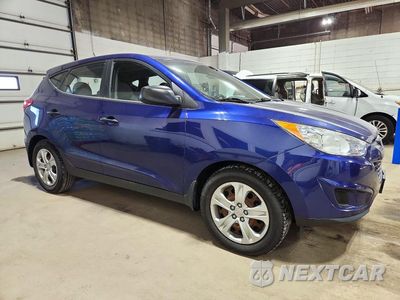 Czwarte zdjęcie samochodu z boku: 2010 HYUNDAI TUCSON GLS VIN:KM8JT3AC4AU112389 - miniatura