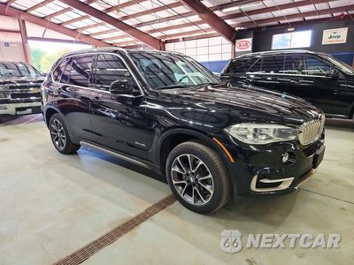 Czwarte zdjęcie samochodu z boku: 2018 BMW X5 XDRIVE35I VIN:5UXKR0C5XJL072229 - miniatura