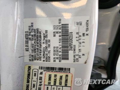 Zdjęcie 12 z 12 samochodu: 2013 FORD FUSION SE PHEV VIN:3FA6P0PUXDR235516 - miniatura