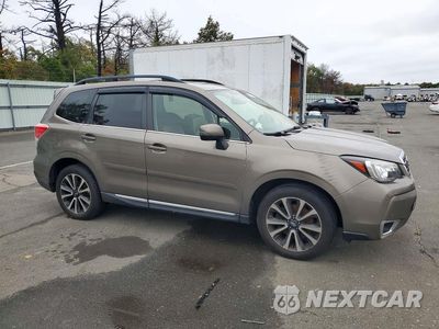 Czwarte zdjęcie samochodu z boku: 2017 SUBARU FORESTER 2.0XT TOURING VIN:JF2SJGWC9HH554572 - miniatura