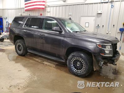 Czwarte zdjęcie samochodu z boku: 2017 CHEVROLET TAHOE SPECIAL VIN:1GNSKFKC7HR184610 - miniatura