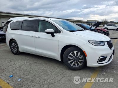 Czwarte zdjęcie samochodu z boku: 2023 CHRYSLER PACIFICA HYBRID TOURING L VIN:2C4RC1L76PR594932 - miniatura