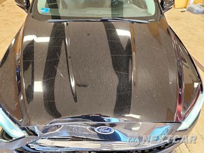 Zdjęcie 11 z 12 samochodu: 2017 FORD FUSION TITANIUM VIN:3FA6P0D94HR211007 - miniatura