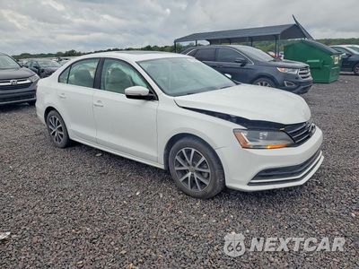 Czwarte zdjęcie samochodu z boku: 2017 VOLKSWAGEN JETTA VIN:3VWDB7AJ9HM305448 - miniatura