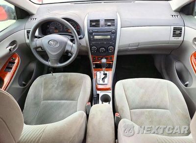Zdjęcie 8 z 12 samochodu: 2009 TOYOTA COROLLA XLE VIN:1NXBU40E59Z017054 - miniatura