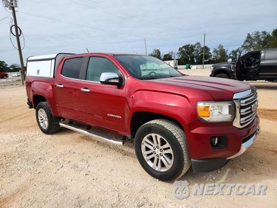 Czwarte zdjęcie samochodu z boku: 2017 GMC CANYON SLT VIN:1GTG5DENXH1290491 - miniatura