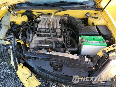 Zdjęcie 11 z 13 samochodu: 2006 HYUNDAI TIBURON GT VIN:KMHHN65F56U220106 - miniatura