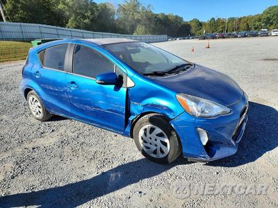 Czwarte zdjęcie samochodu z boku: 2015 TOYOTA PRIUS C TWO VIN:JTDKDTB30F1101564 - miniatura