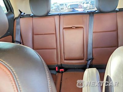 Zdjęcie 10 z 13 samochodu: 2014 BUICK ENCORE PREMIUM VIN:KL4CJDSB5EB624690 - miniatura