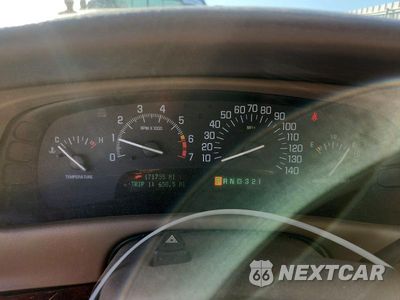 Zdjęcie 9 z 12 samochodu: 1999 BUICK PARK AVENUE ULTRA VIN:1G4CU5219X4619988 - miniatura
