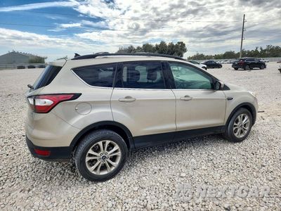 Trzecie zdjęcie samochodu z tyłu: 2018 FORD ESCAPE SEL VIN:1FMCU0HD0JUD04086 - miniatura