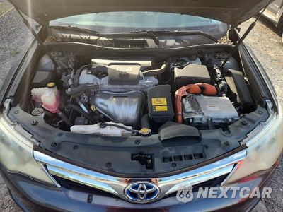 Zdjęcie 11 z 12 samochodu: 2012 TOYOTA CAMRY HYBRID XLE VIN:4T1BD1FKXCU060842 - miniatura