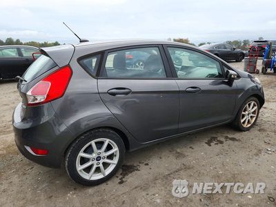 Trzecie zdjęcie samochodu z tyłu: 2015 FORD FIESTA SE VIN:3FADP4EJ4FM132731 - miniatura