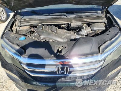 Zdjęcie 12 z 13 samochodu: 2016 HONDA PILOT LX VIN:5FNYF5H12GB030995 - miniatura