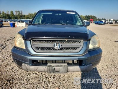 Piąte zdjęcie samochodu w środku: 2005 HONDA PILOT EXL VIN:5FNYF18665B014395 - miniatura
