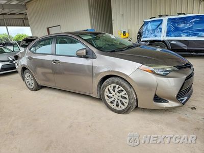 Czwarte zdjęcie samochodu z boku: 2017 TOYOTA COROLLA LE VIN:5YFBURHE2HP662391 - miniatura